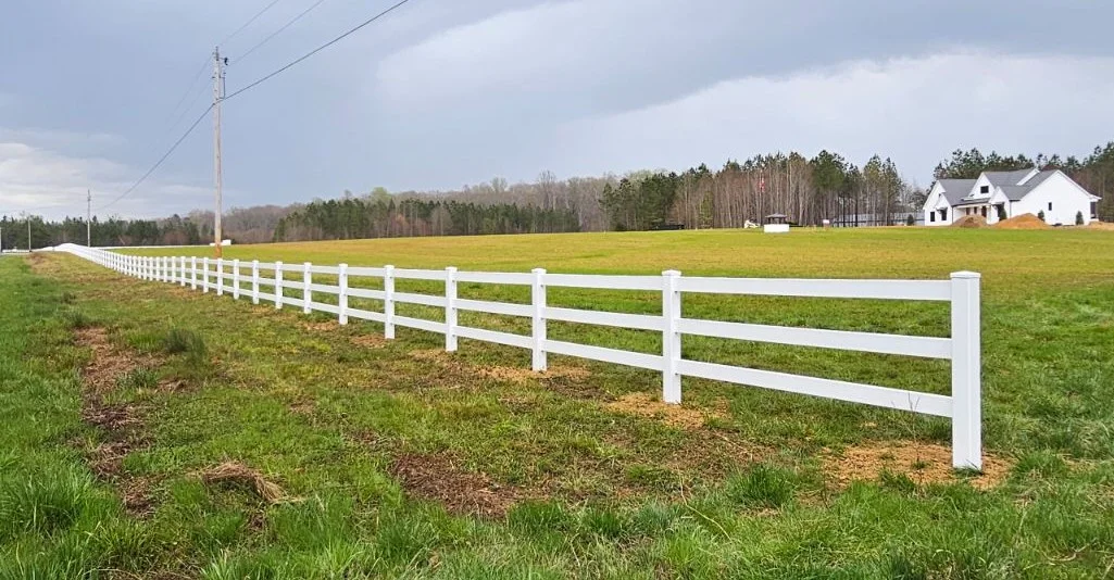 Vinyl fence installed by Sierra Structures on a ferm in Wilmington, NC