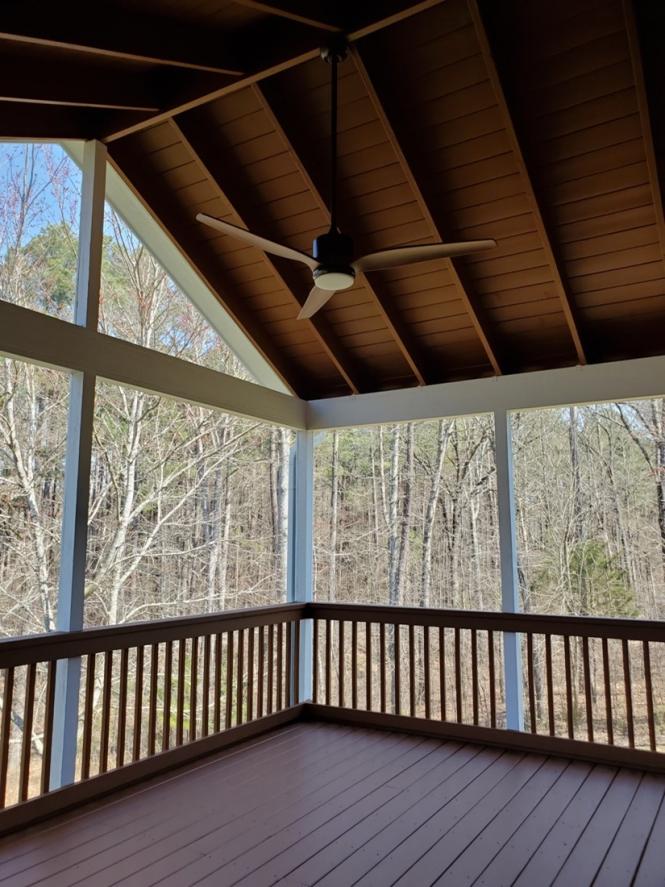 High-end deck and covered porch with fan